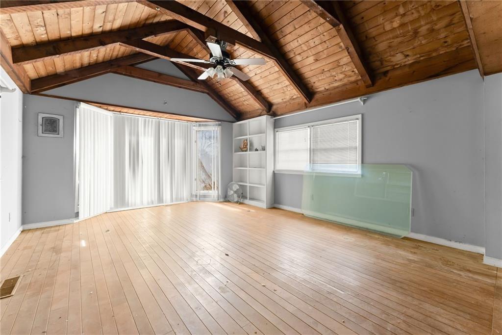 111 Skitts Mountain Road Cleveland, GA 30528 - Photo 42 of 60 a view of empty room with wooden floor and fan