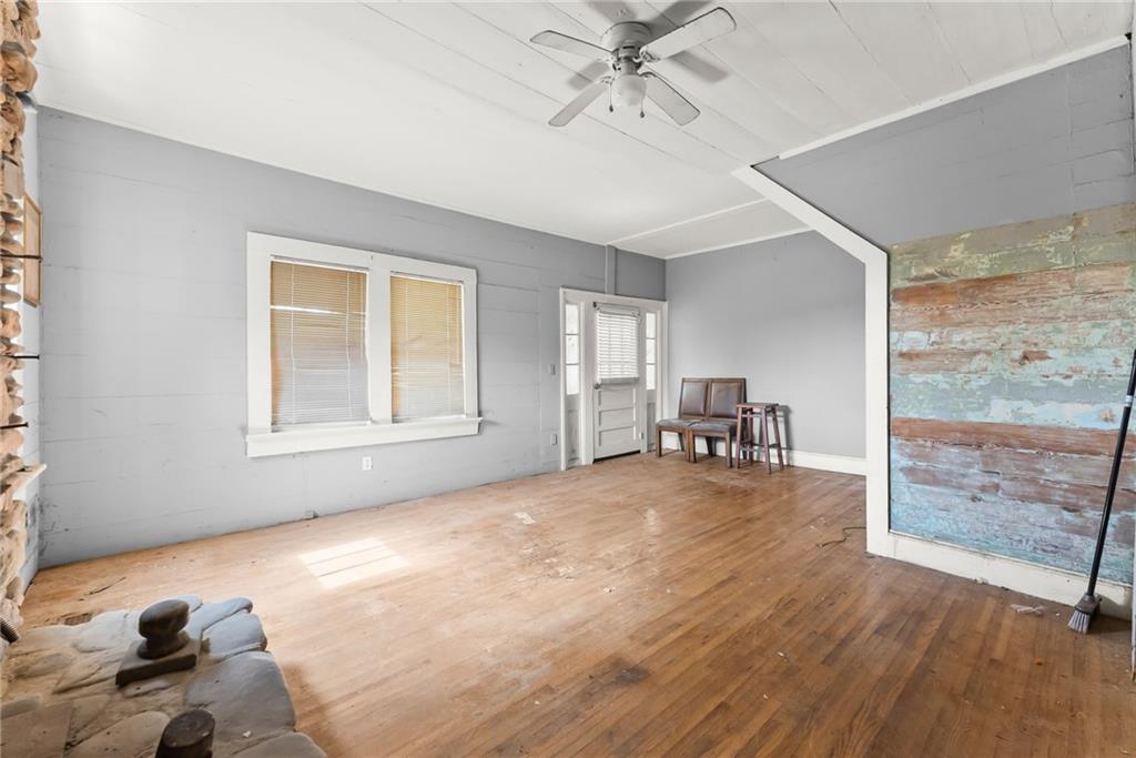 111 Skitts Mountain Road Cleveland, GA 30528 - Photo 46 of 60 a furnished livingroom with a window and wooden floor