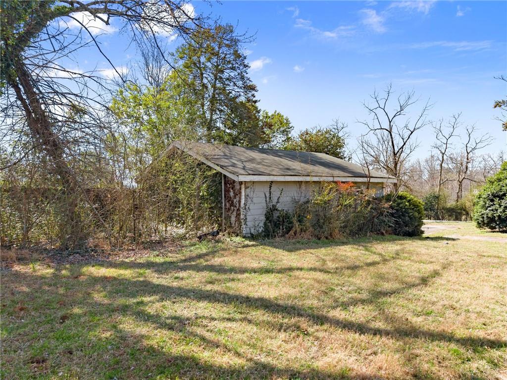 111 Skitts Mountain Road Cleveland, GA 30528 - Photo 49 of 60 a view of a house with a yard