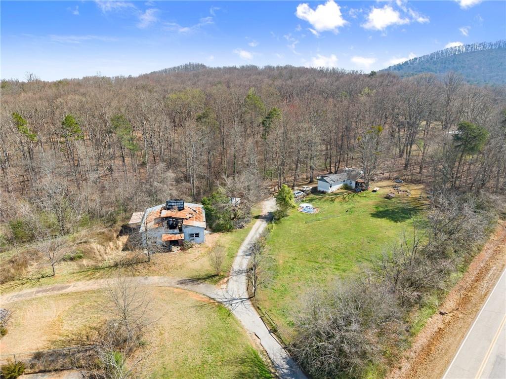 111 Skitts Mountain Road Cleveland, GA 30528 - Photo 50 of 60 a view of a swimming pool with a yard