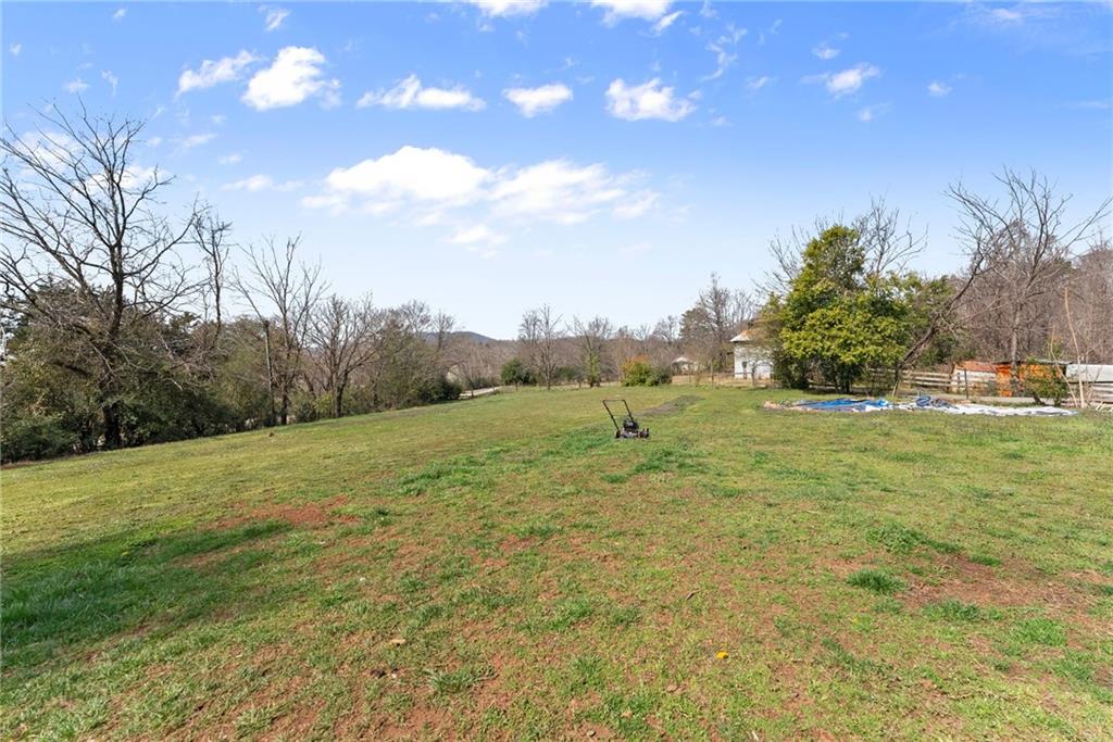 111 Skitts Mountain Road Cleveland, GA 30528 - Photo 58 of 60 a view of a field of grass and trees