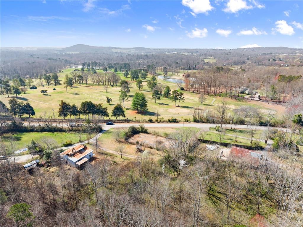 111 Skitts Mountain Road Cleveland, GA 30528 - Photo 6 of 60 a view of a lake with a mountain