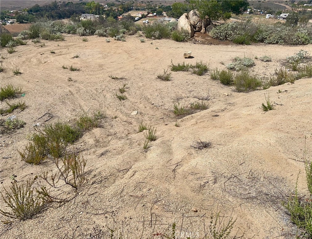 20755 Bentley Drive Perris, CA 92570 - Photo 11 of 21 a view of a yard covered in snow