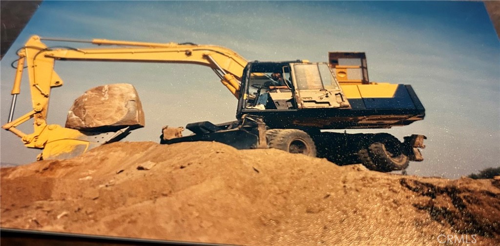 20755 Bentley Drive Perris, CA 92570 - Photo 18 of 21 a bed sitting in a bedroom next to a window