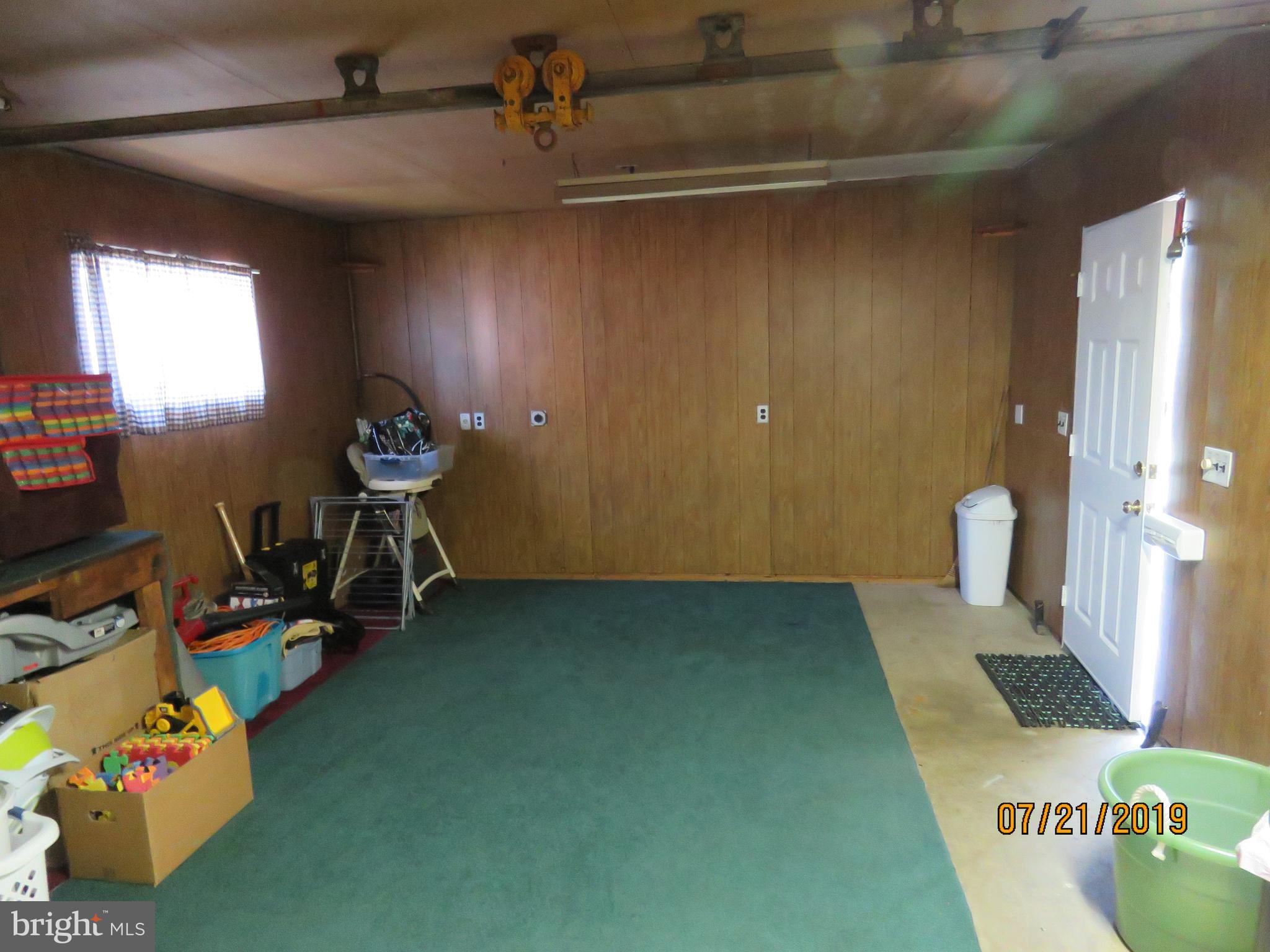 50 Quail Road Levittown, PA 19057 - Photo 11 of 18 Back part of garage is 15' x 15' with hoist
