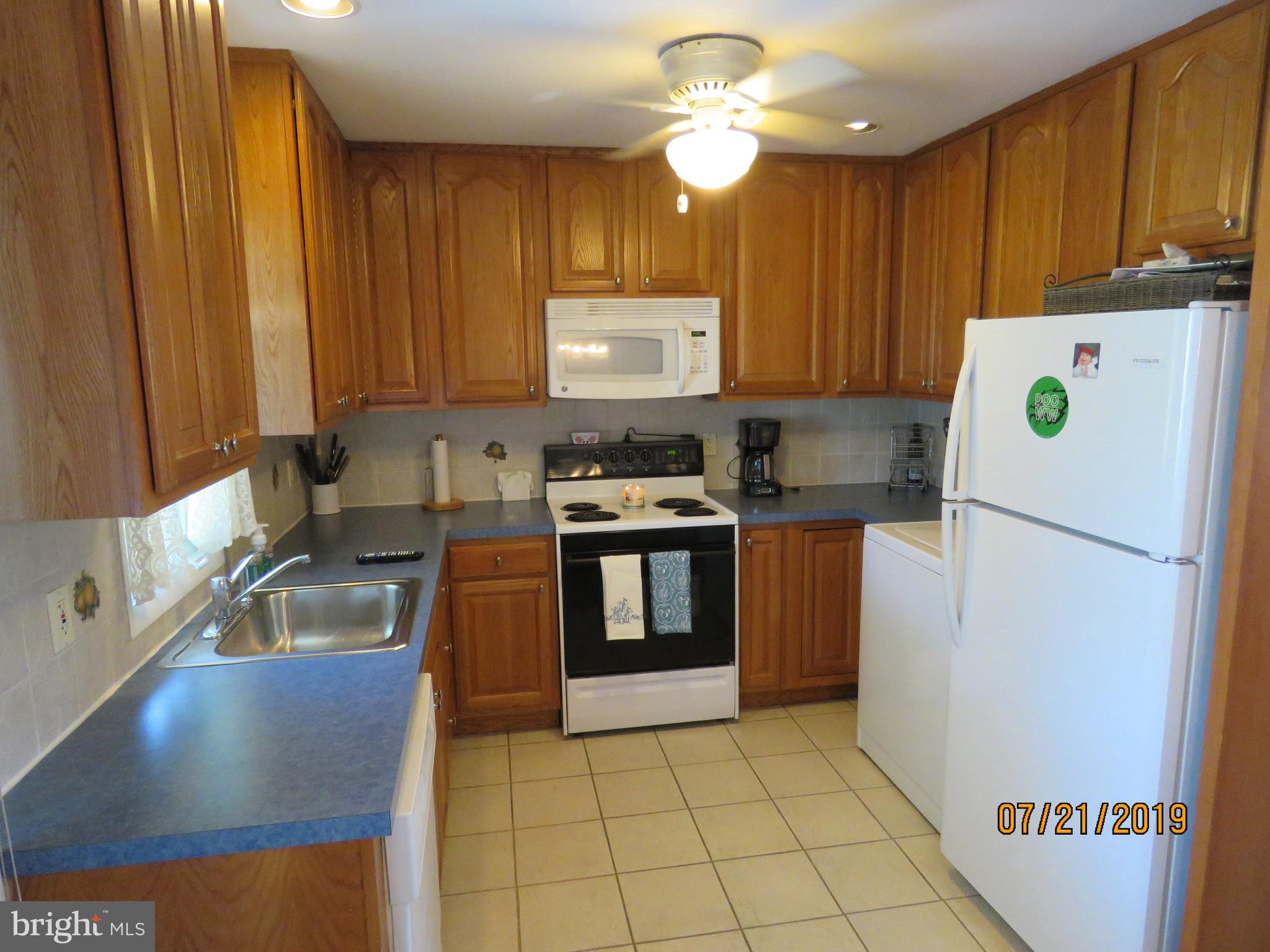 50 Quail Road Levittown, PA 19057 - Photo 3 of 18 Kitchen has dishwasher and 1 year old refrigerator