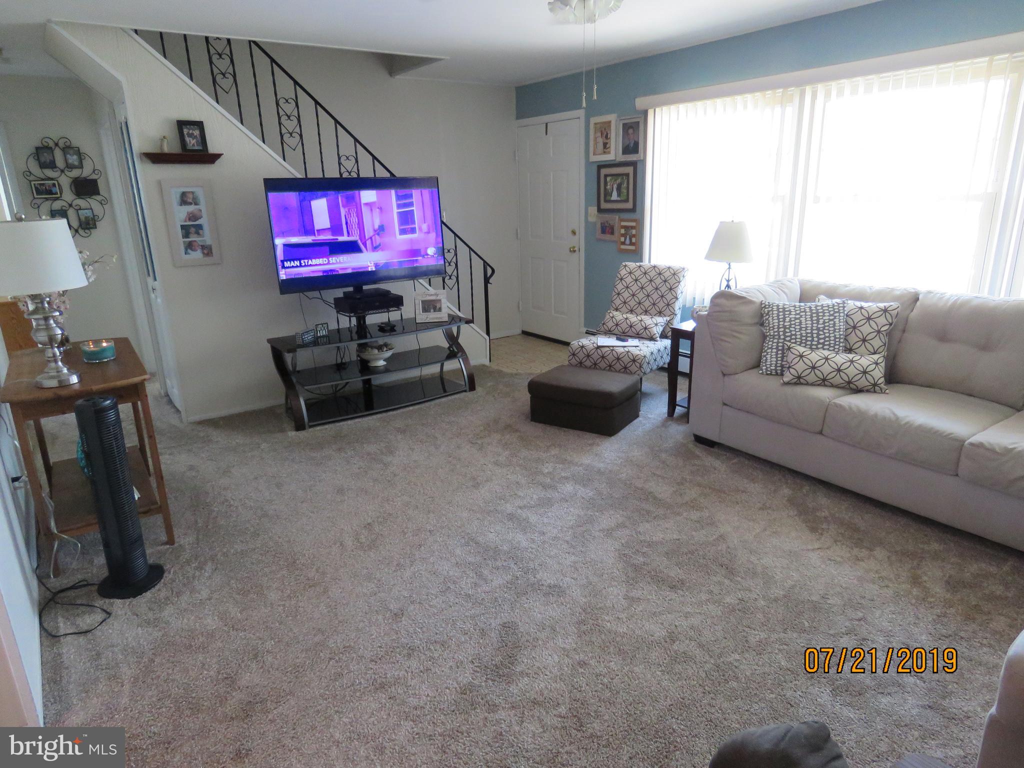 50 Quail Road Levittown, PA 19057 - Photo 6 of 18 Living room has plenty of natural light