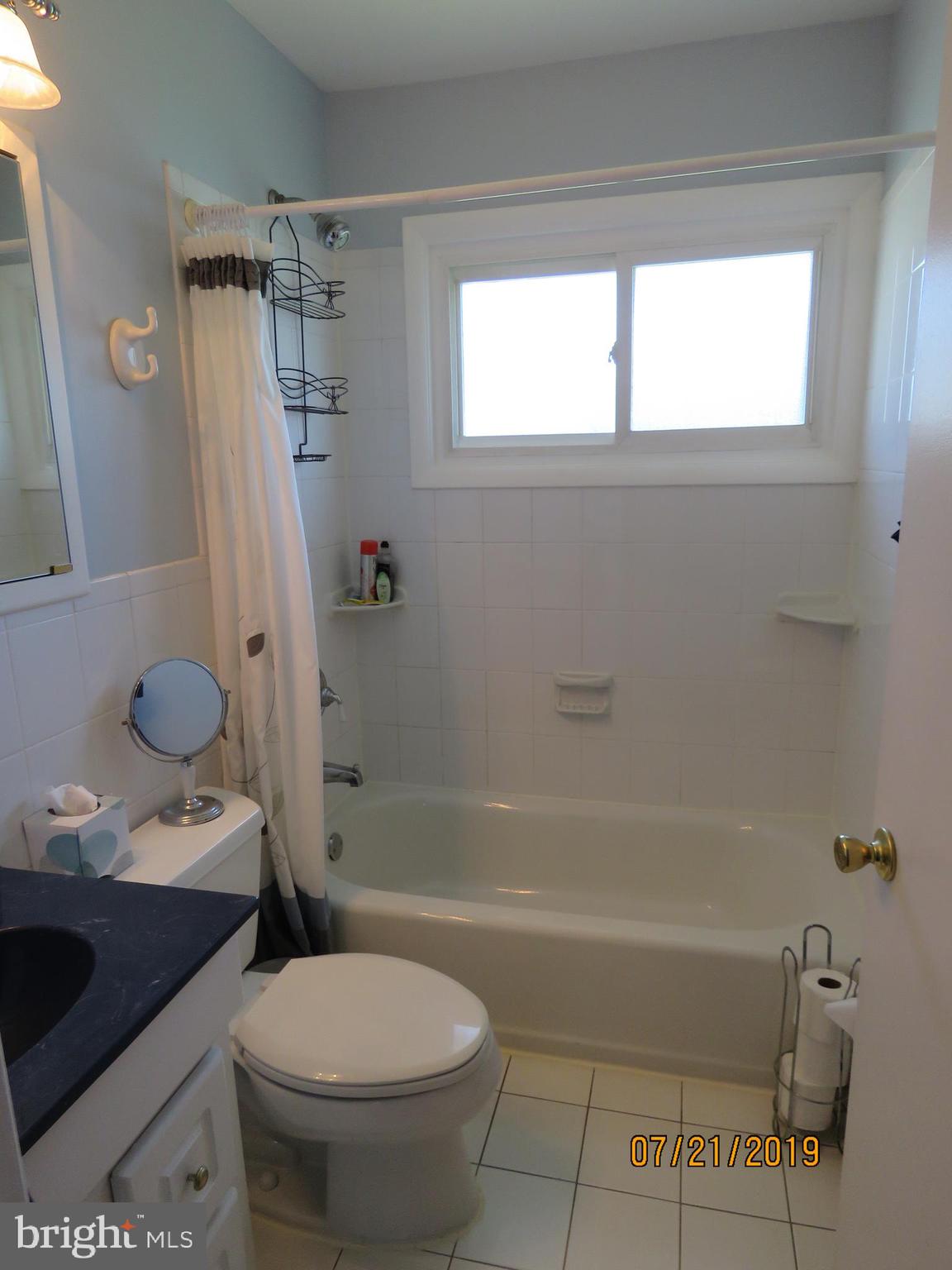 50 Quail Road Levittown, PA 19057 - Photo 9 of 18 1st floor bathroom
