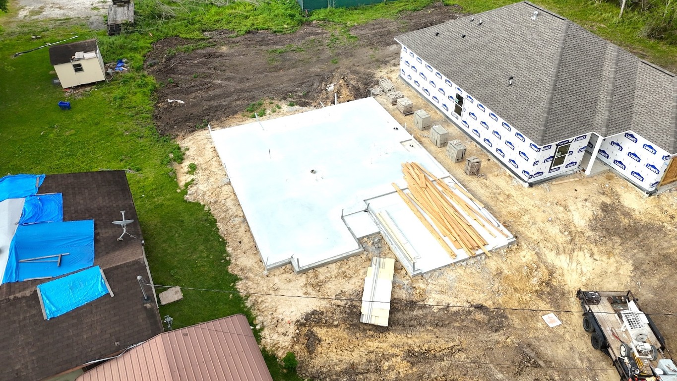 3475 St James Boulevard Beaumont, TX 77705 - Photo 2 of 7 an aerial view of a house having outdoor space