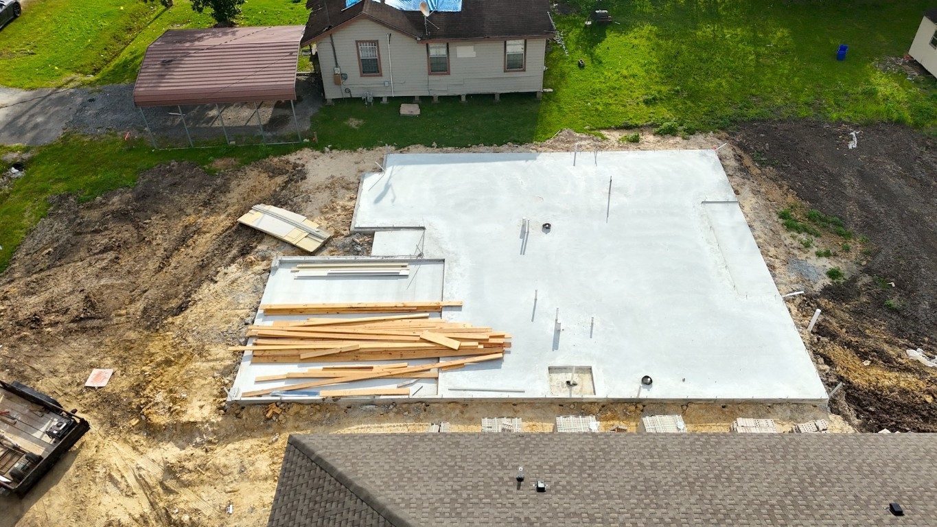 3475 St James Boulevard Beaumont, TX 77705 - Photo 7 of 7 an aerial view of a house with a yard