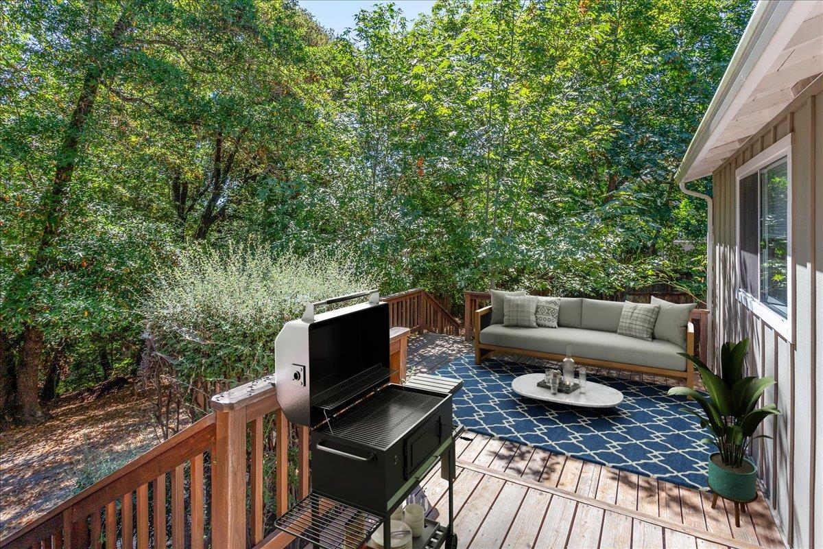 21685 Woolaroc Drive Los Gatos, CA 95033 - Photo 18 of 28 a outdoor living space with furniture and a fireplace