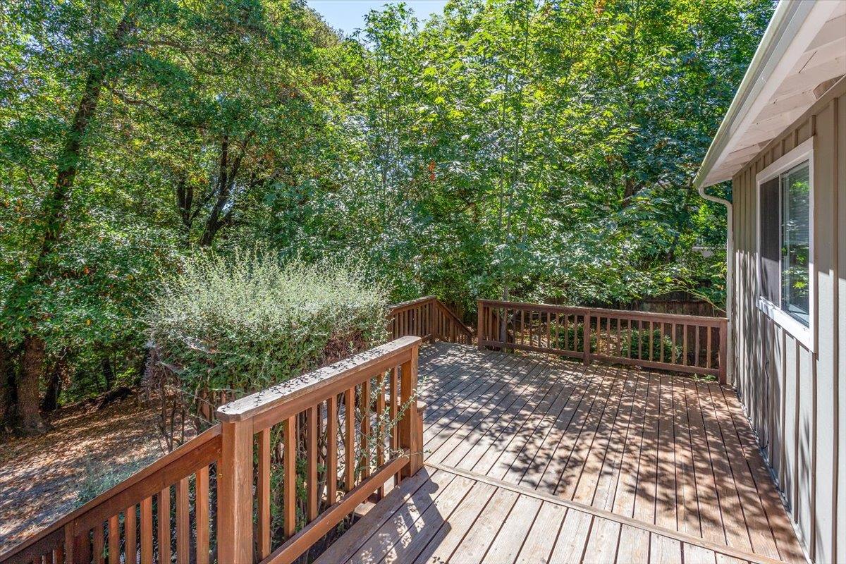 21685 Woolaroc Drive Los Gatos, CA 95033 - Photo 22 of 28 a view of balcony with wooden fence and trees