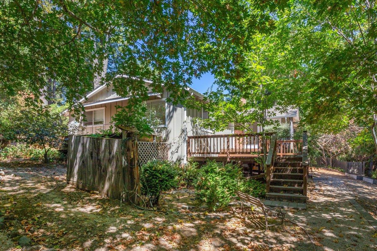 21685 Woolaroc Drive Los Gatos, CA 95033 - Photo 26 of 28 a view of a deck in front of a house with a yard