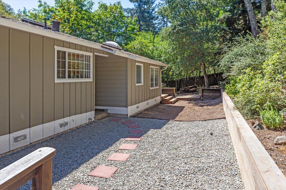 21685 Woolaroc Drive Los Gatos, CA 95033 - Photo 4 of 28 a backyard of a house with seating space