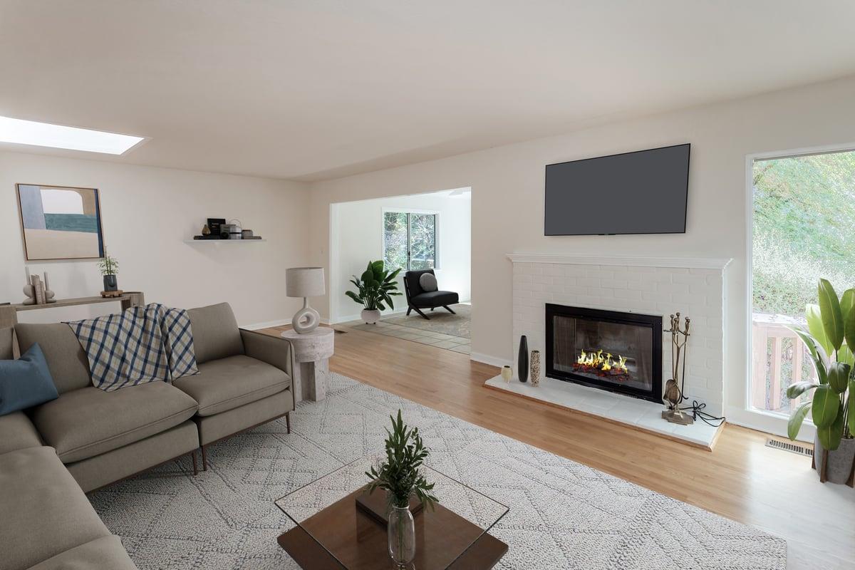 21685 Woolaroc Drive Los Gatos, CA 95033 - Photo 5 of 28 a living room with furniture a fireplace and a flat screen tv