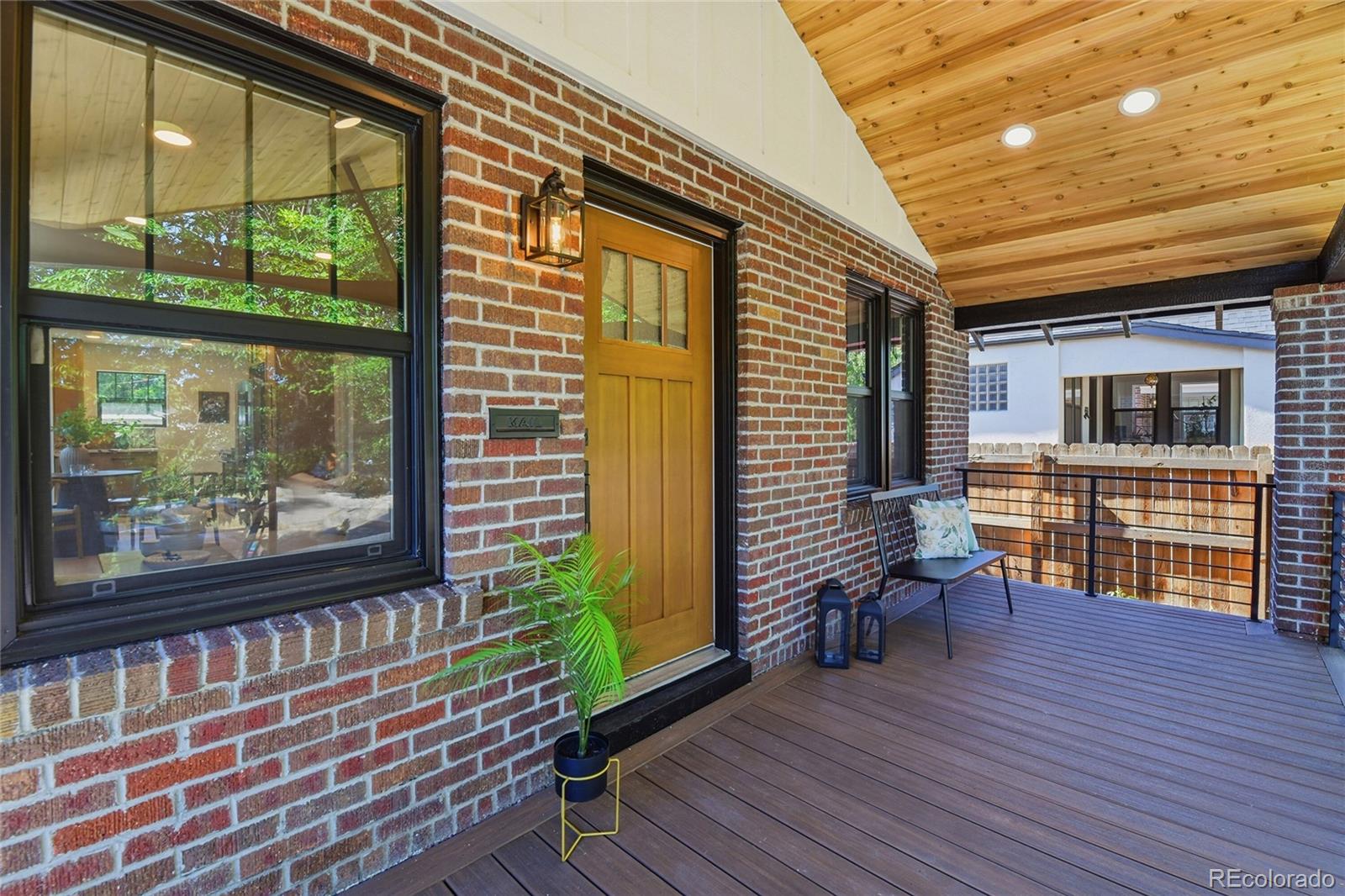 4545 Decatur Street Denver, CO 80211 - Photo 3 of 30 a porch with wooden floor