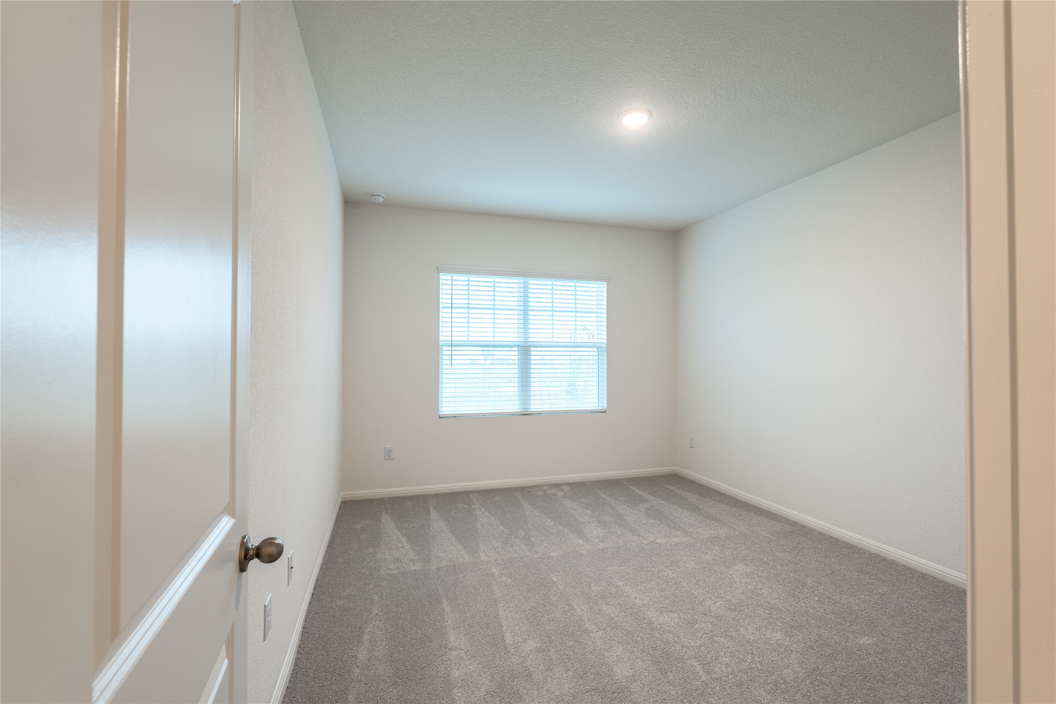 144 Mullen Way Taylor, TX 76574 - Photo 21 of 26 an empty room with a window