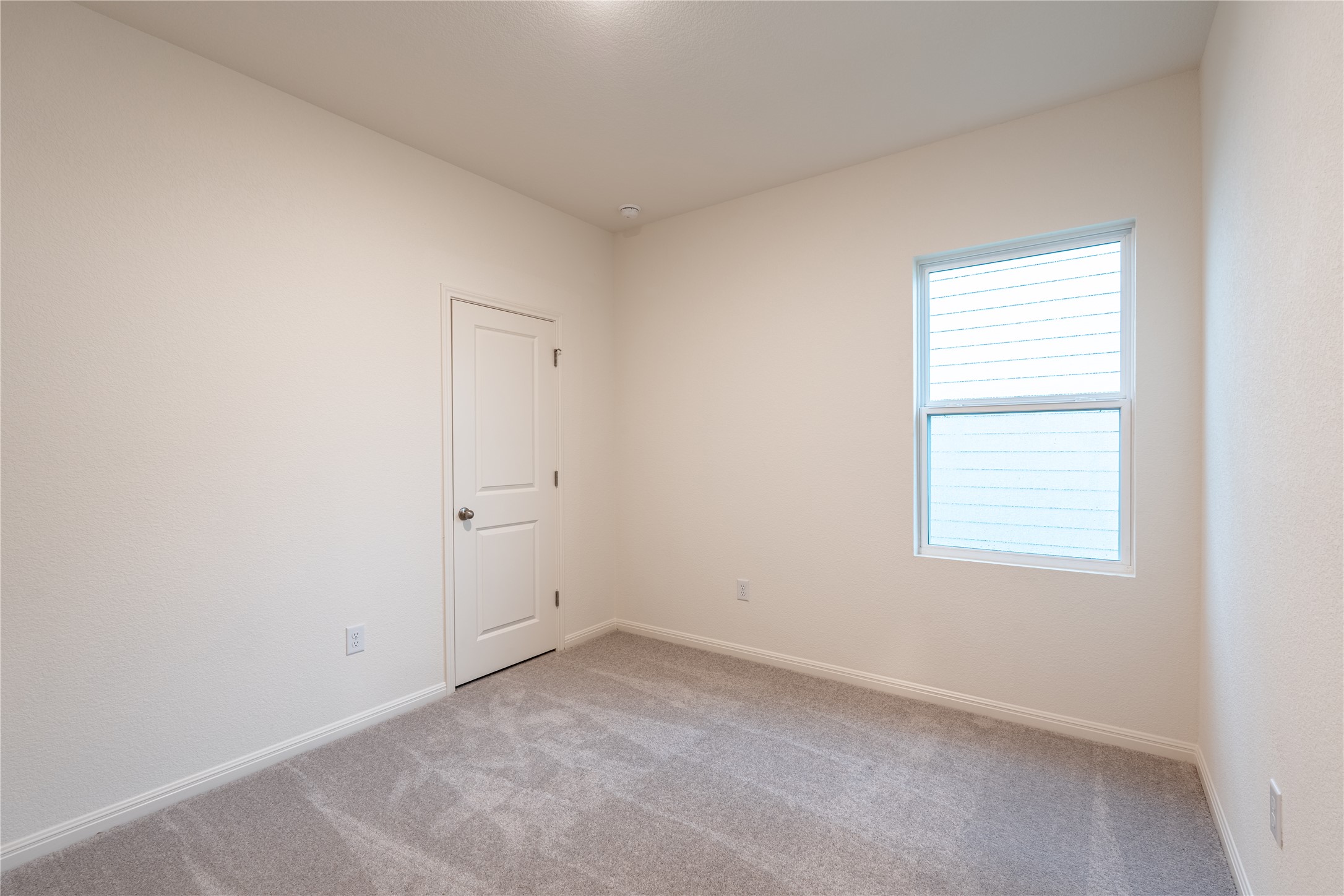 144 Mullen Way Taylor, TX 76574 - Photo 25 of 26 an empty room with a window