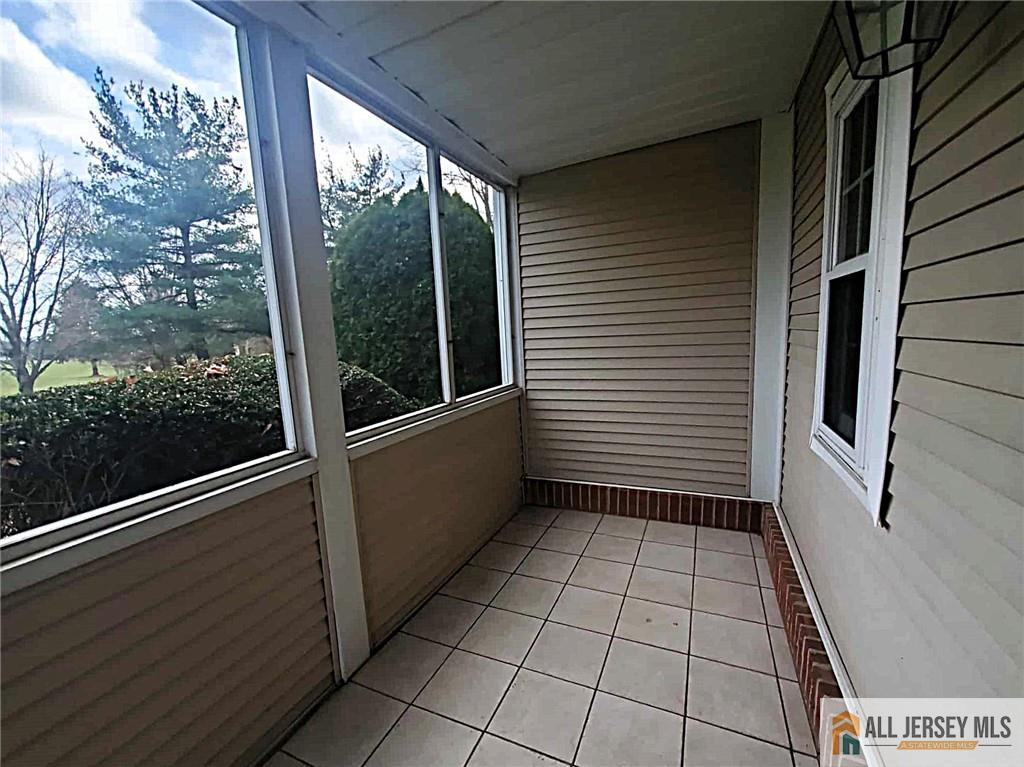 38 Rutland Lane, Unit 38A Monroe Township, NJ 08831 - Photo 16 of 19 a view of an empty room with a window