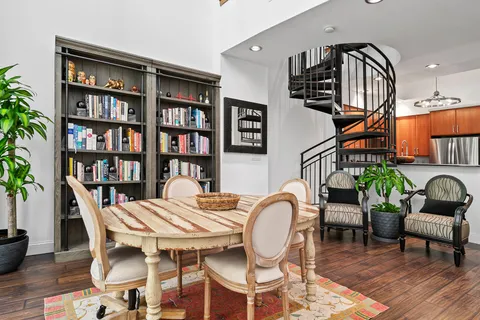 a view of a livingroom and dining room