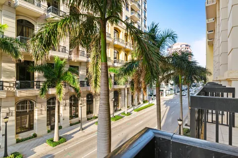 a view of a chairs and table in patio