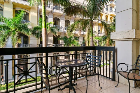 a view of balcony with a potted plant