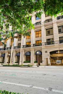 a tall building sitting on the side of a street