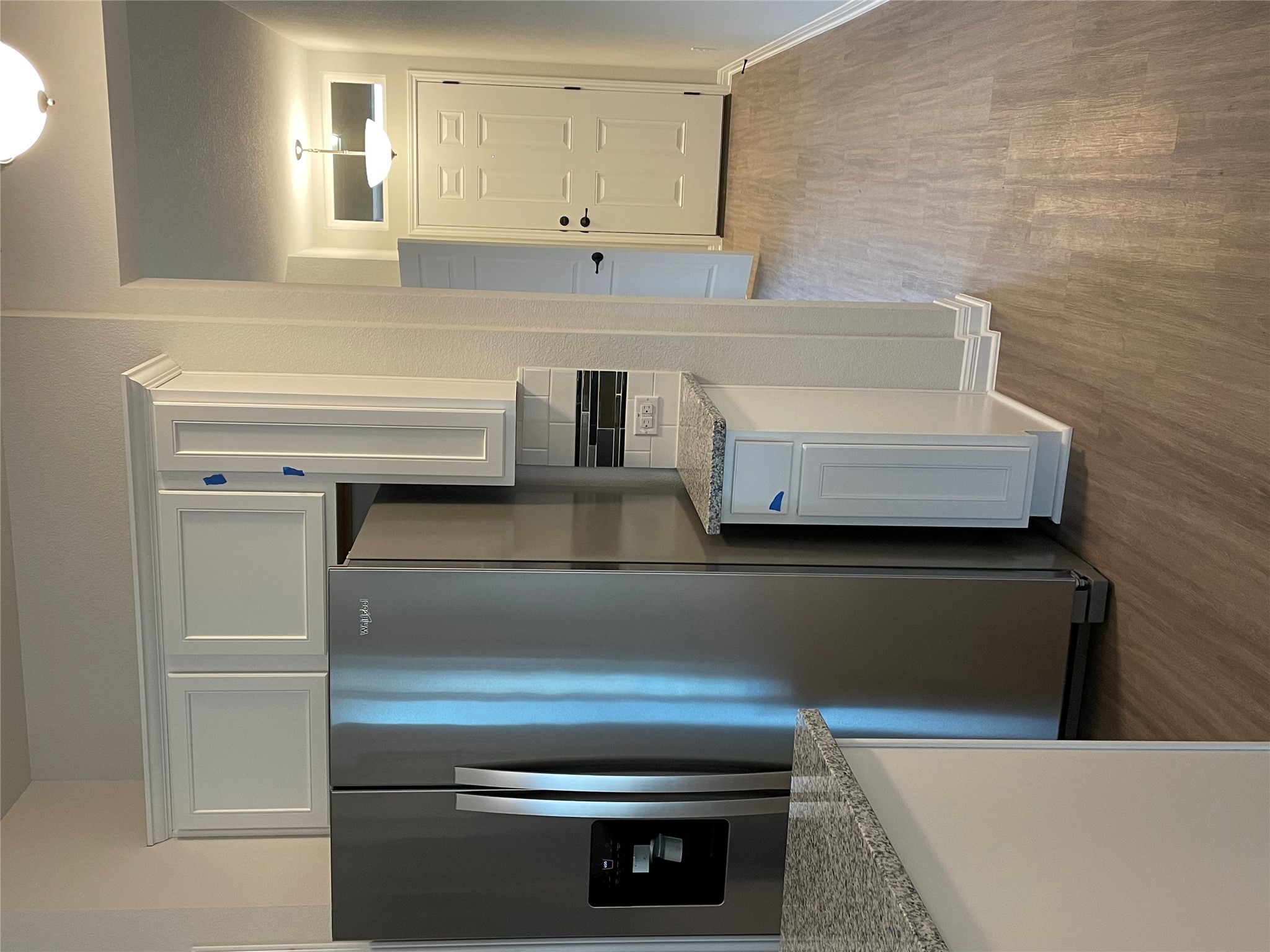 3908 Birdwatch Loop, Unit 56 Pflugerville, TX 78660 - Photo 6 of 30 a kitchen with granite countertop a refrigerator and a sink