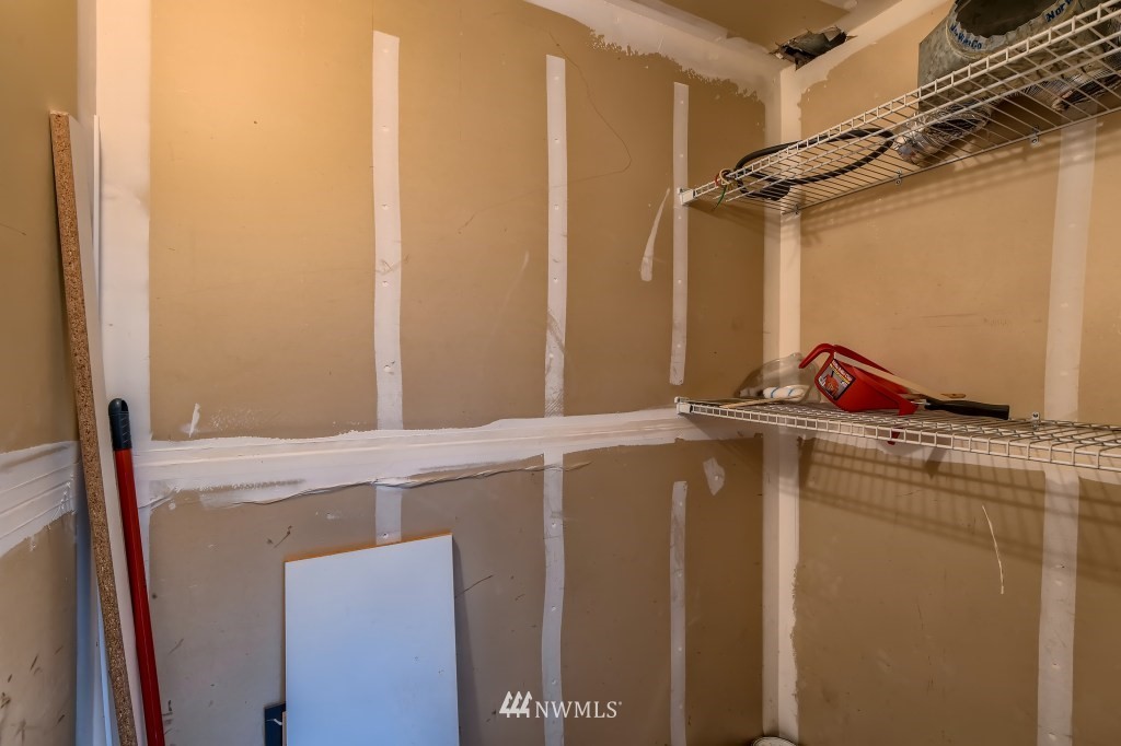 19410 Bothell Way Northeast, Unit D202 Bothell, WA 98011 - Photo 12 of 26 a utility room with dryer and washer