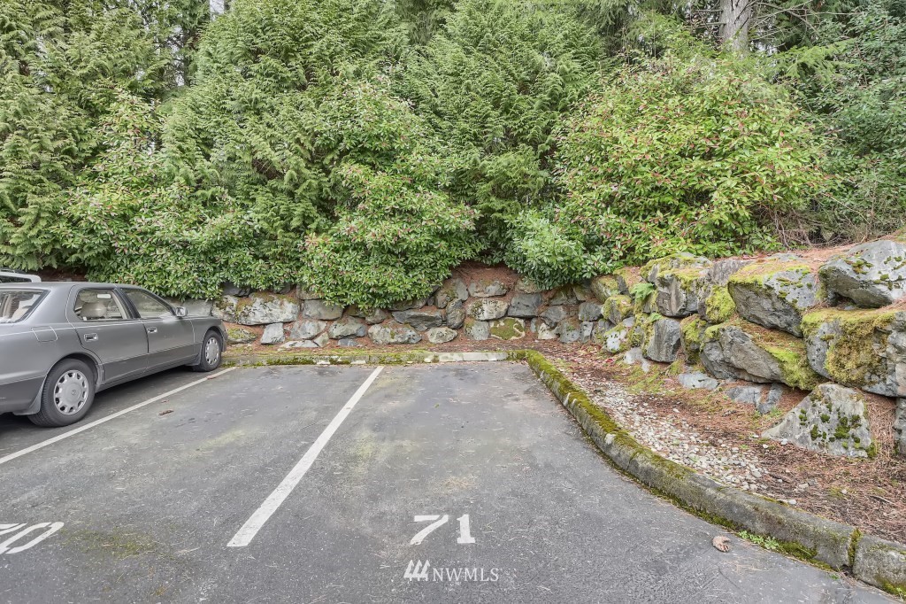 19410 Bothell Way Northeast, Unit D202 Bothell, WA 98011 - Photo 26 of 26 a view of a car parked in a parking area