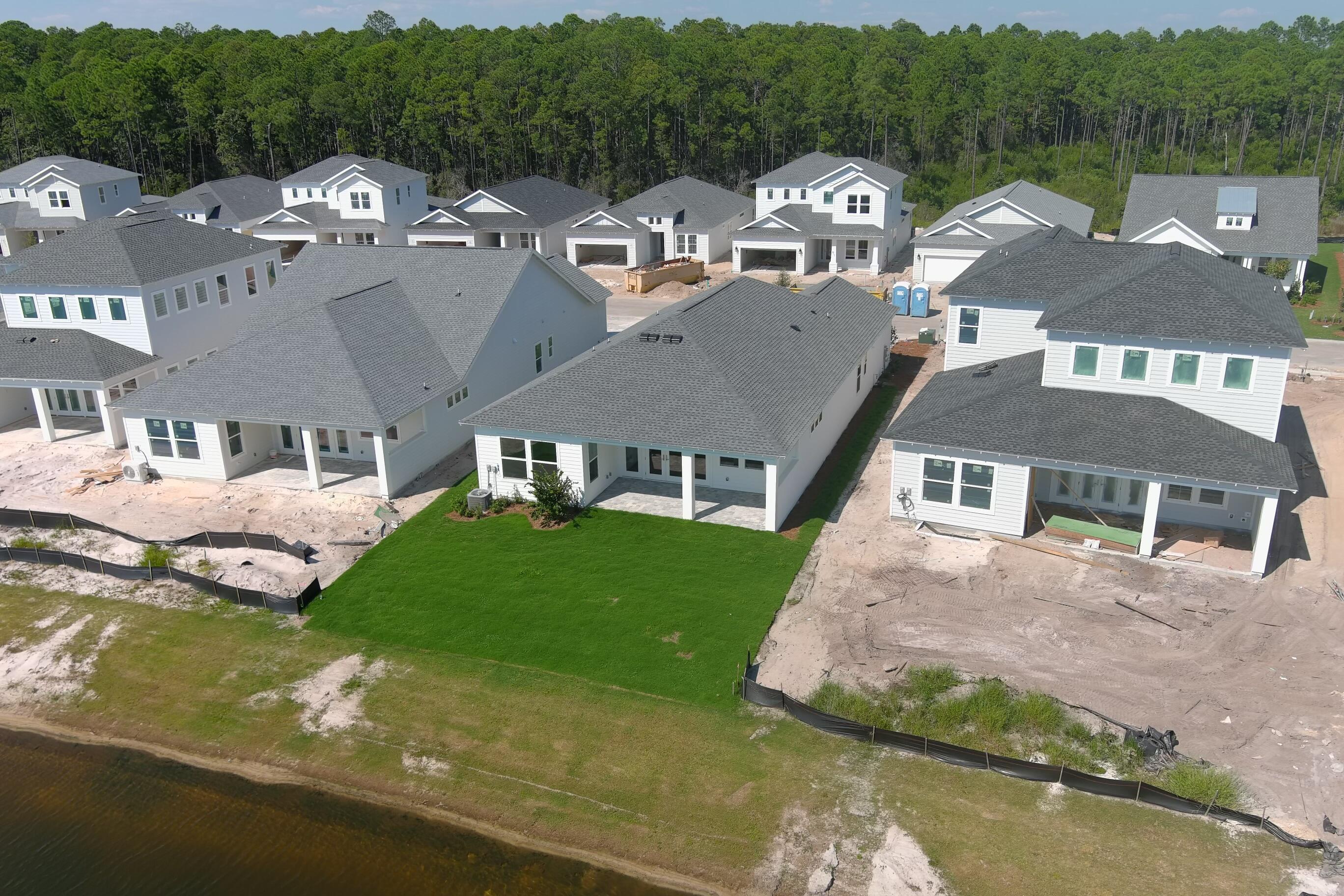 2332 Pathways Drive Watersound, FL 32461 - Photo 3 of 13 an aerial view of multiple houses with yard