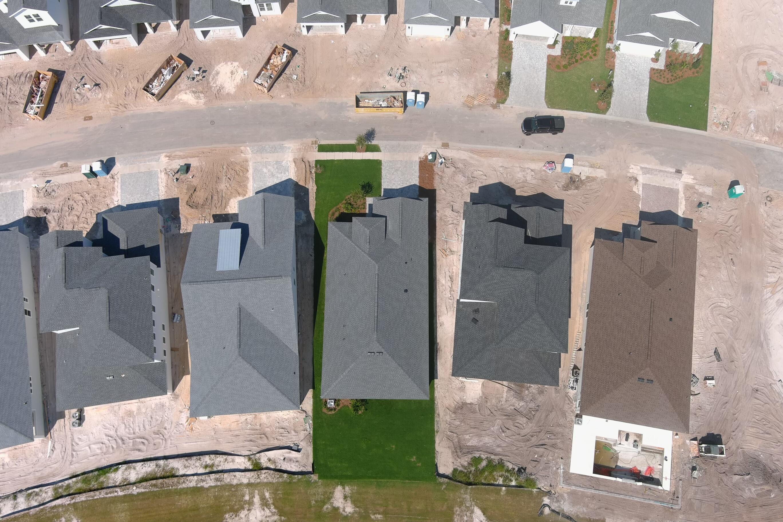 2332 Pathways Drive Watersound, FL 32461 - Photo 5 of 13 a bathroom with a granite countertop shower and a mirror