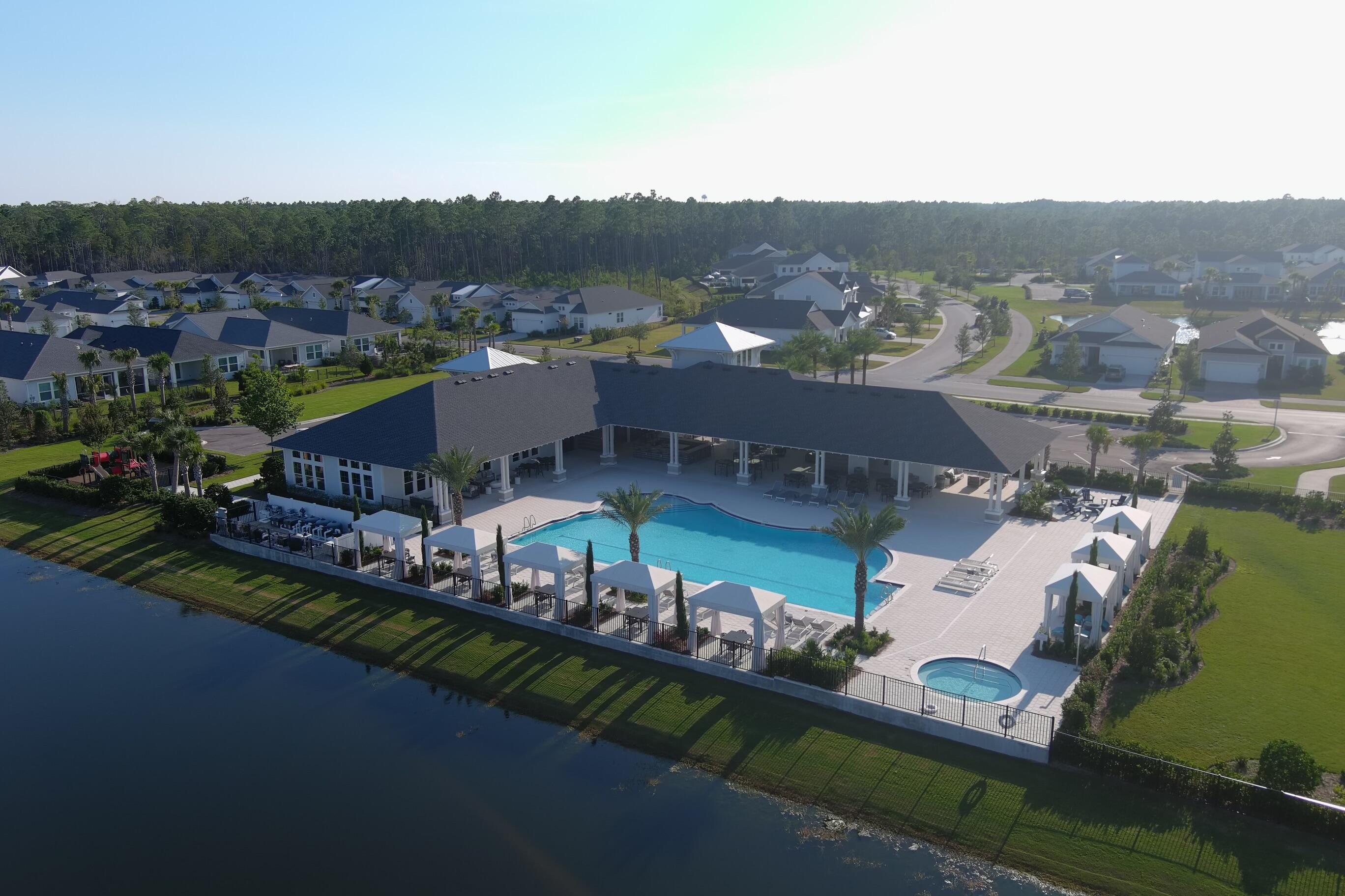 2332 Pathways Drive Watersound, FL 32461 - Photo 7 of 13 an aerial view of a house with a garden