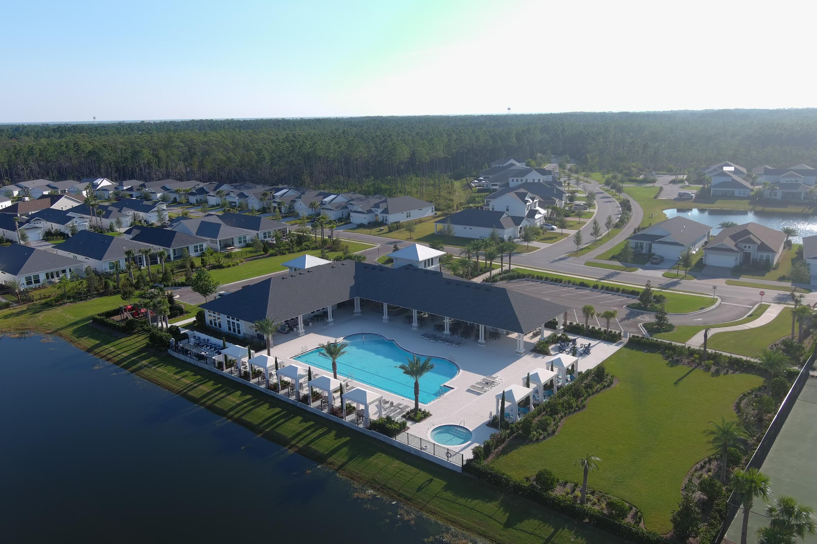 2332 Pathways Drive Watersound, FL 32461 - Photo 10 of 13 an aerial view of a house with a garden