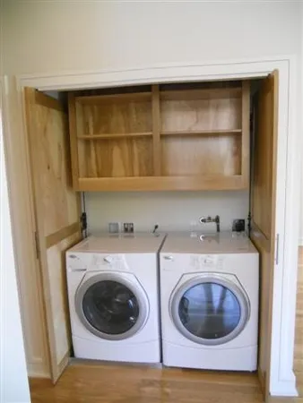 a utility room with dryer and washer