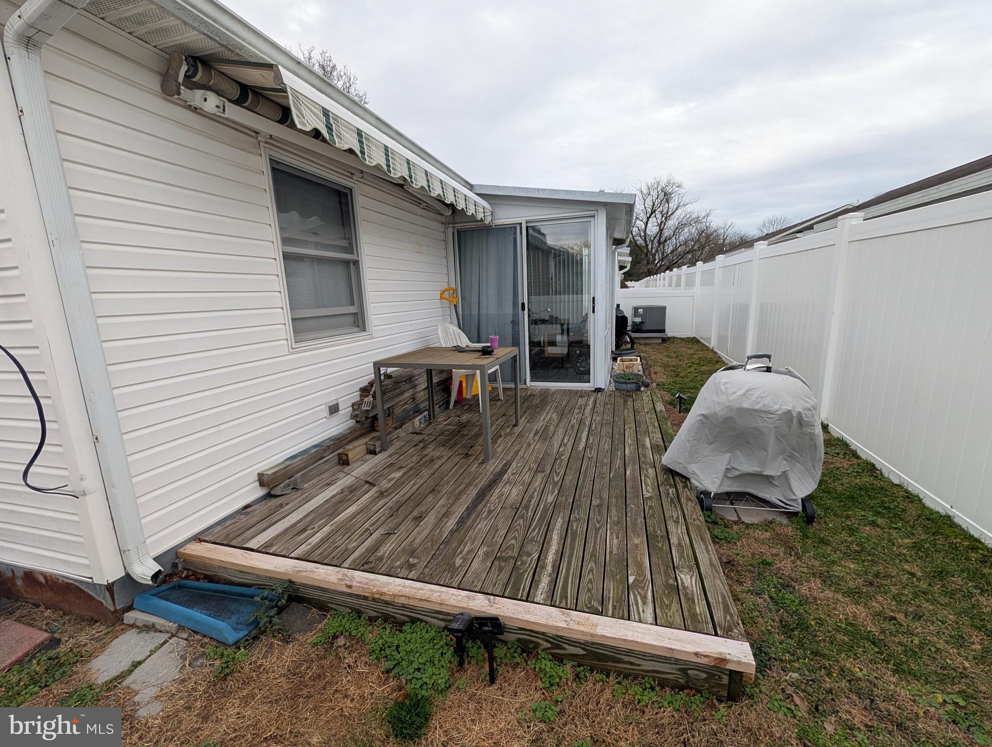 318 Derby Way Millsboro, DE 19966 - Photo 22 of 24 Back Deck with Awning