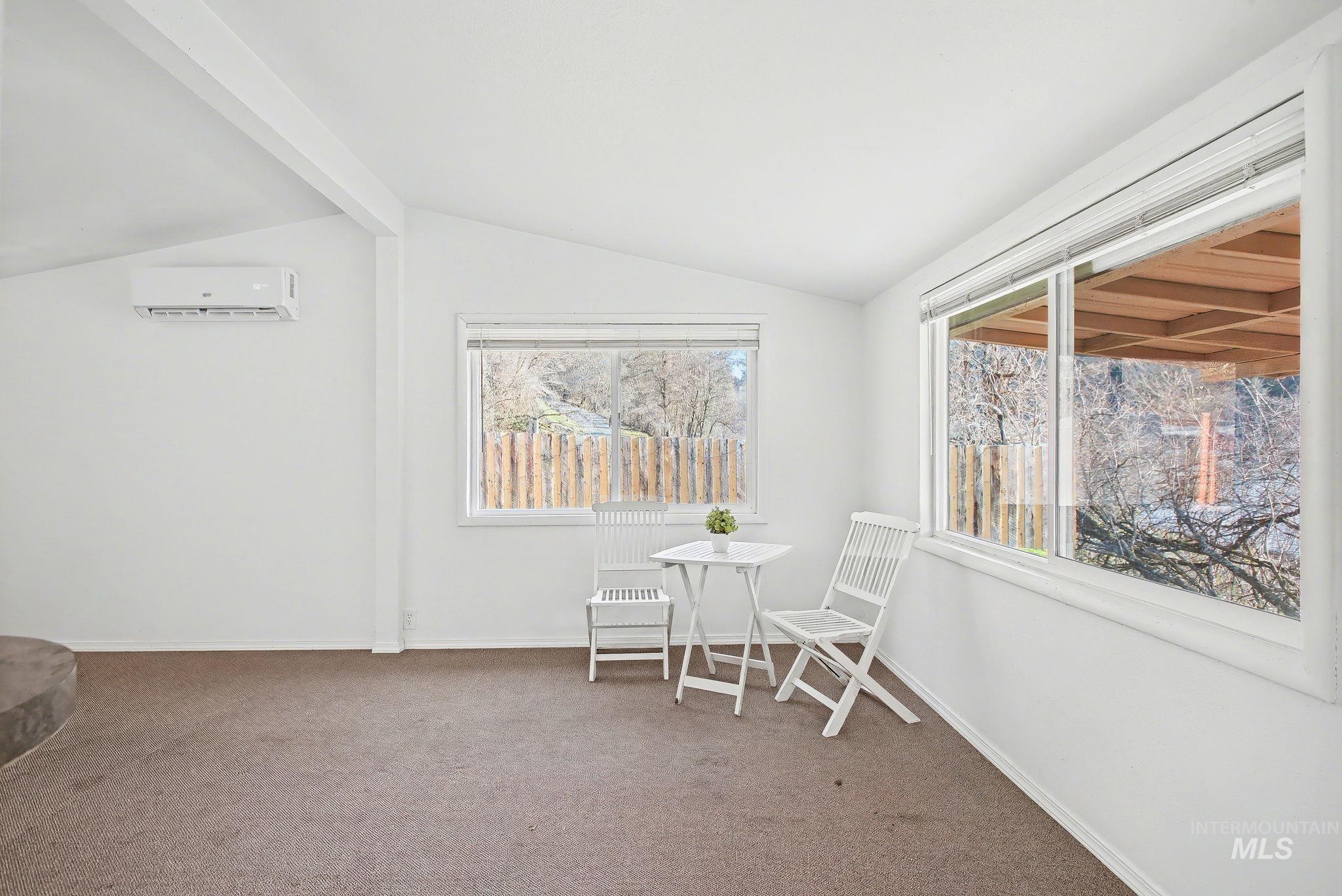 150 Elm Street Orofino, ID 83544 - Photo 3 of 36 Sitting room with carpet flooring and a wall mounted AC