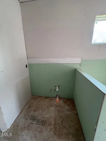 a view of room with washer and dryer