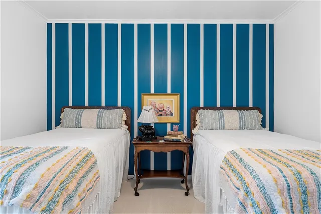 a view of a city with lush green forest