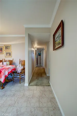a bedroom with furniture and a baby bed