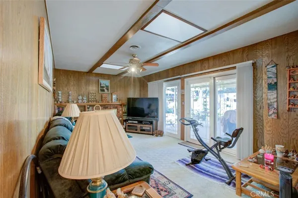 a living room with furniture and a rug