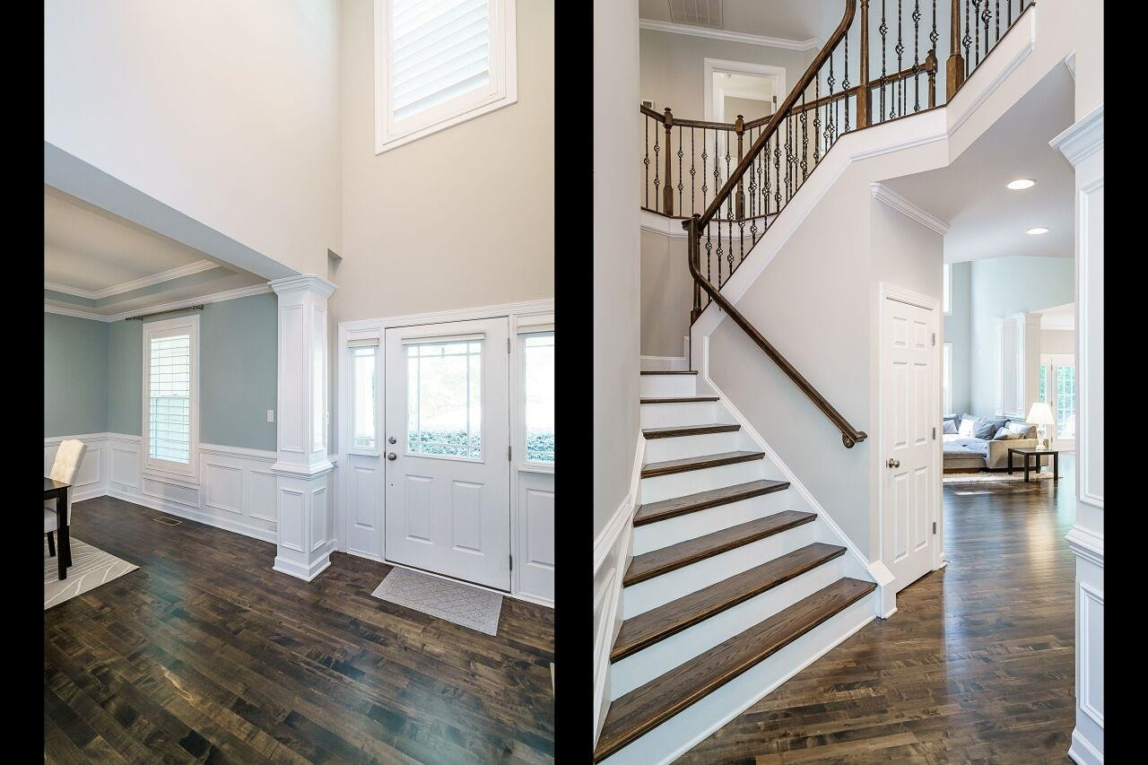 3003 Red Grape Drive Raleigh, NC 27607 - Photo 5 of 35 Gorgeous two story foyer with elaborate trim detail, wrought iron pickets and site finished hardwood steps. Foyer
