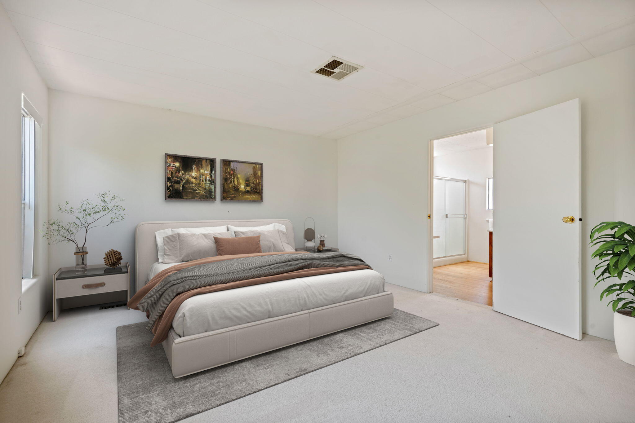 340 Old Mill Road, Unit 107 Santa Barbara, CA 93110 - Photo 13 of 33 a bedroom with a bed and a couch