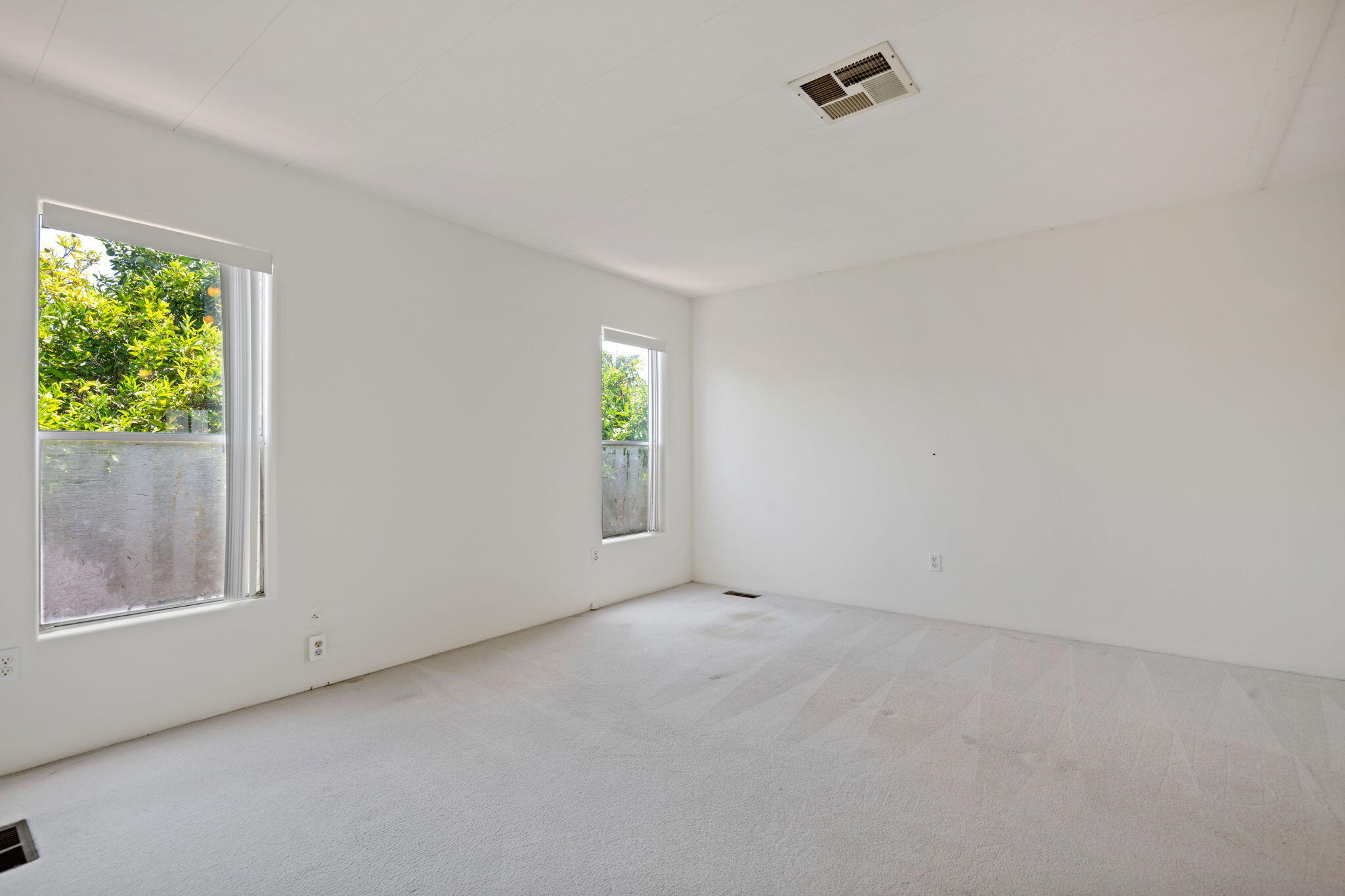 340 Old Mill Road, Unit 107 Santa Barbara, CA 93110 - Photo 14 of 33 an empty room with windows