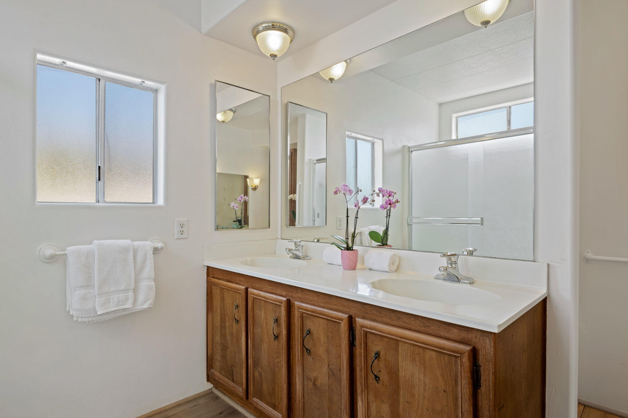 340 Old Mill Road, Unit 107 Santa Barbara, CA 93110 - Photo 19 of 33 a bathroom with a sink and a mirror