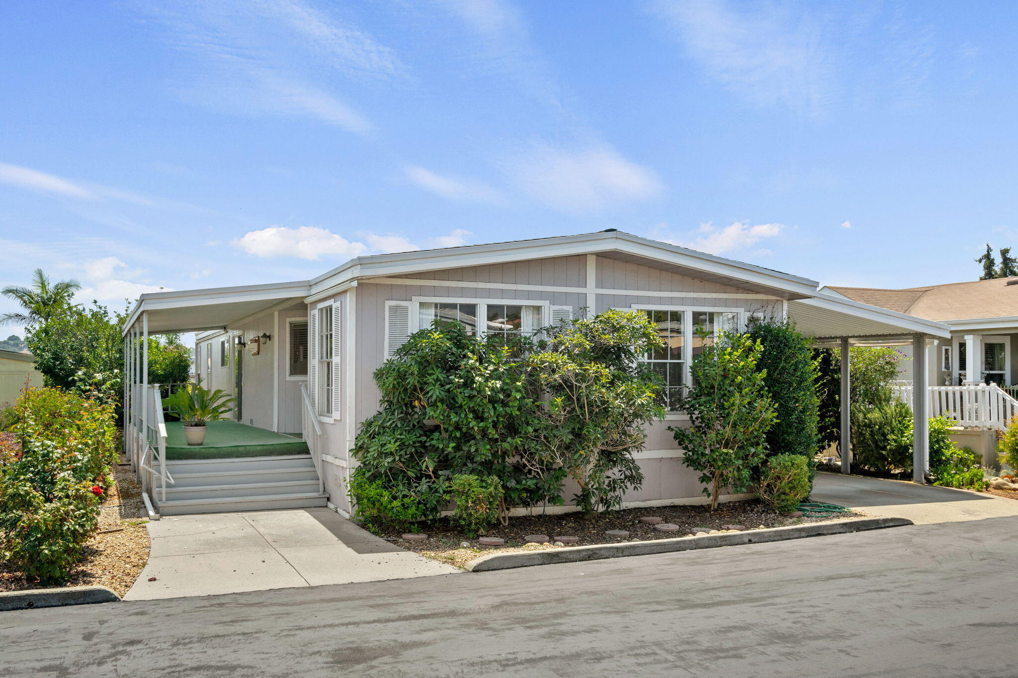 340 Old Mill Road, Unit 107 Santa Barbara, CA 93110 - Photo 2 of 33 a front view of a house with garden