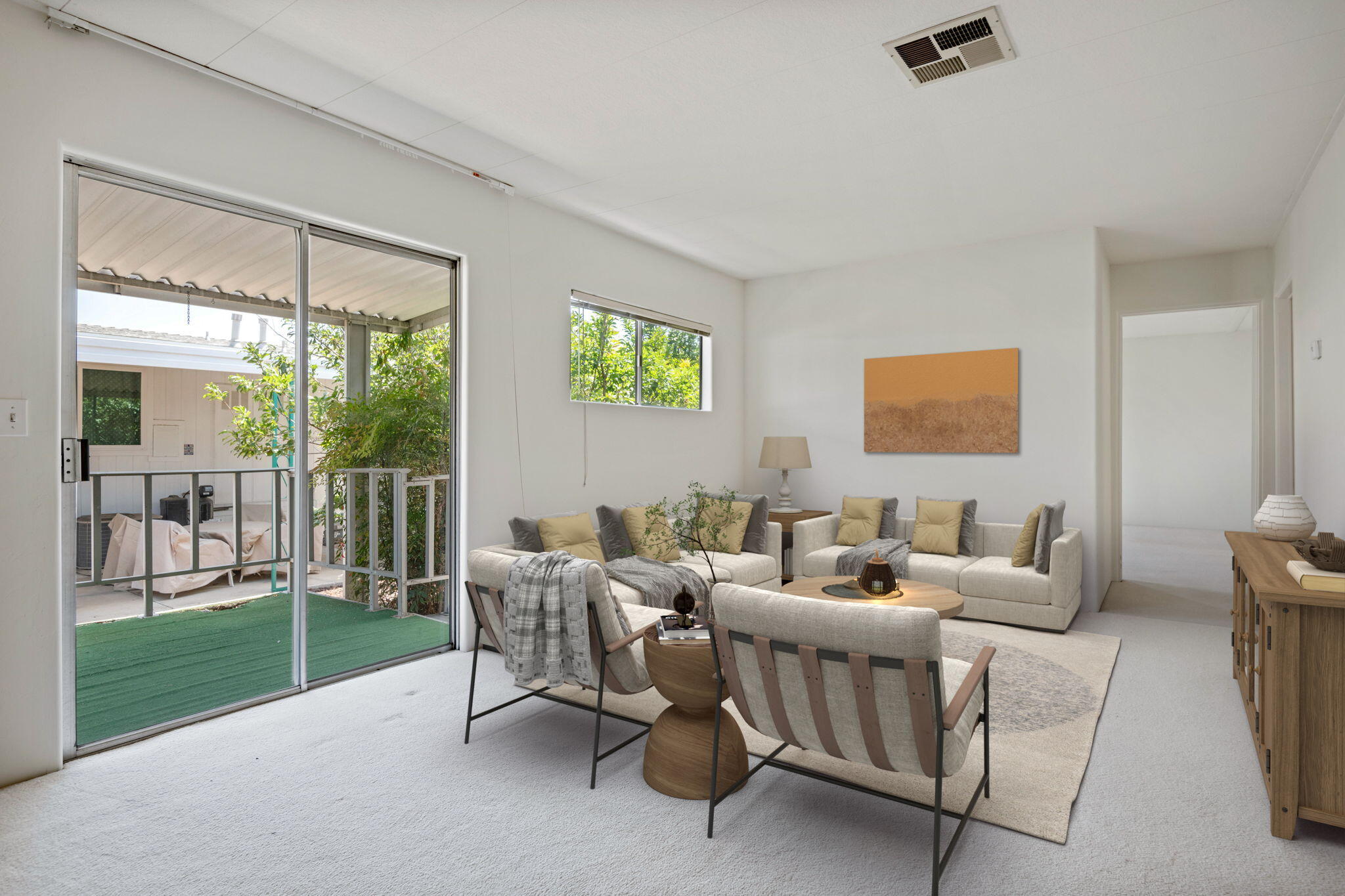 340 Old Mill Road, Unit 107 Santa Barbara, CA 93110 - Photo 7 of 33 a living room with furniture and a floor to ceiling window
