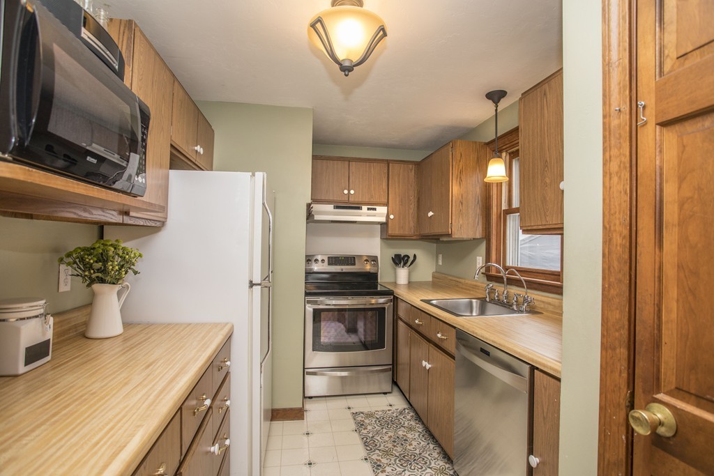648 County Road Wareham, MA 02576 - Photo 15 of 30 a kitchen with a sink and refrigerator
