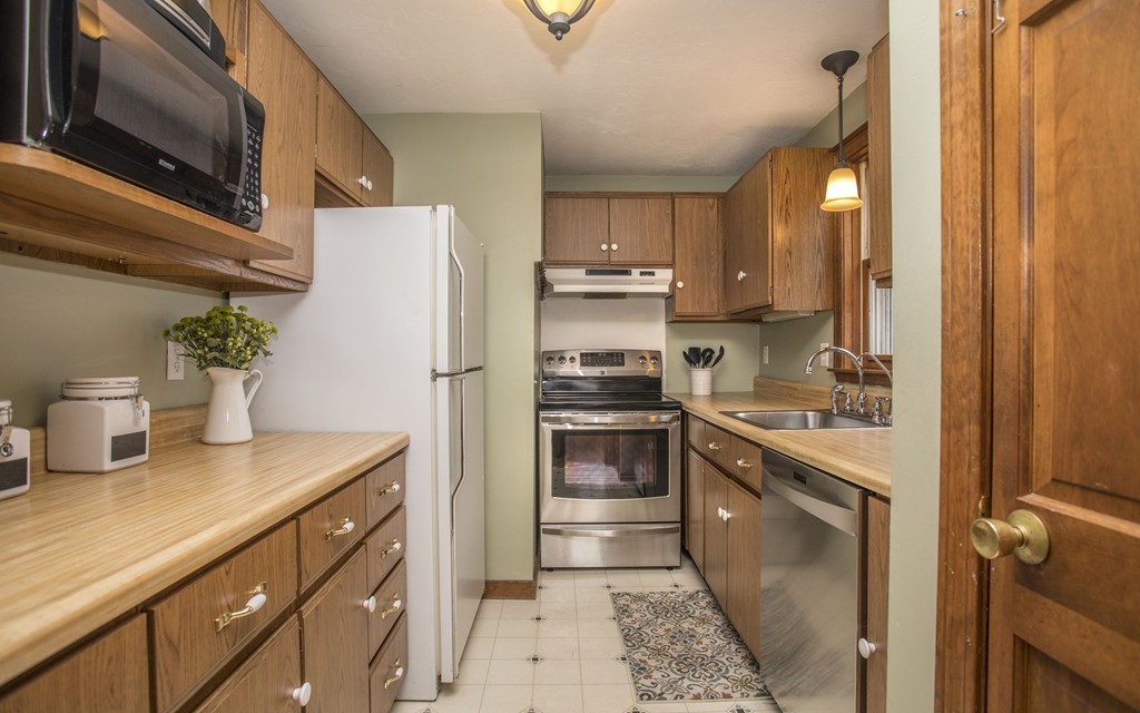 648 County Road Wareham, MA 02576 - Photo 16 of 30 a kitchen with a sink stove and refrigerator