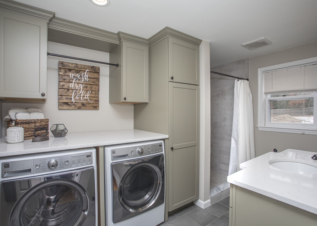 648 County Road Wareham, MA 02576 - Photo 19 of 30 a view of a storage and utility room with washer and dryer